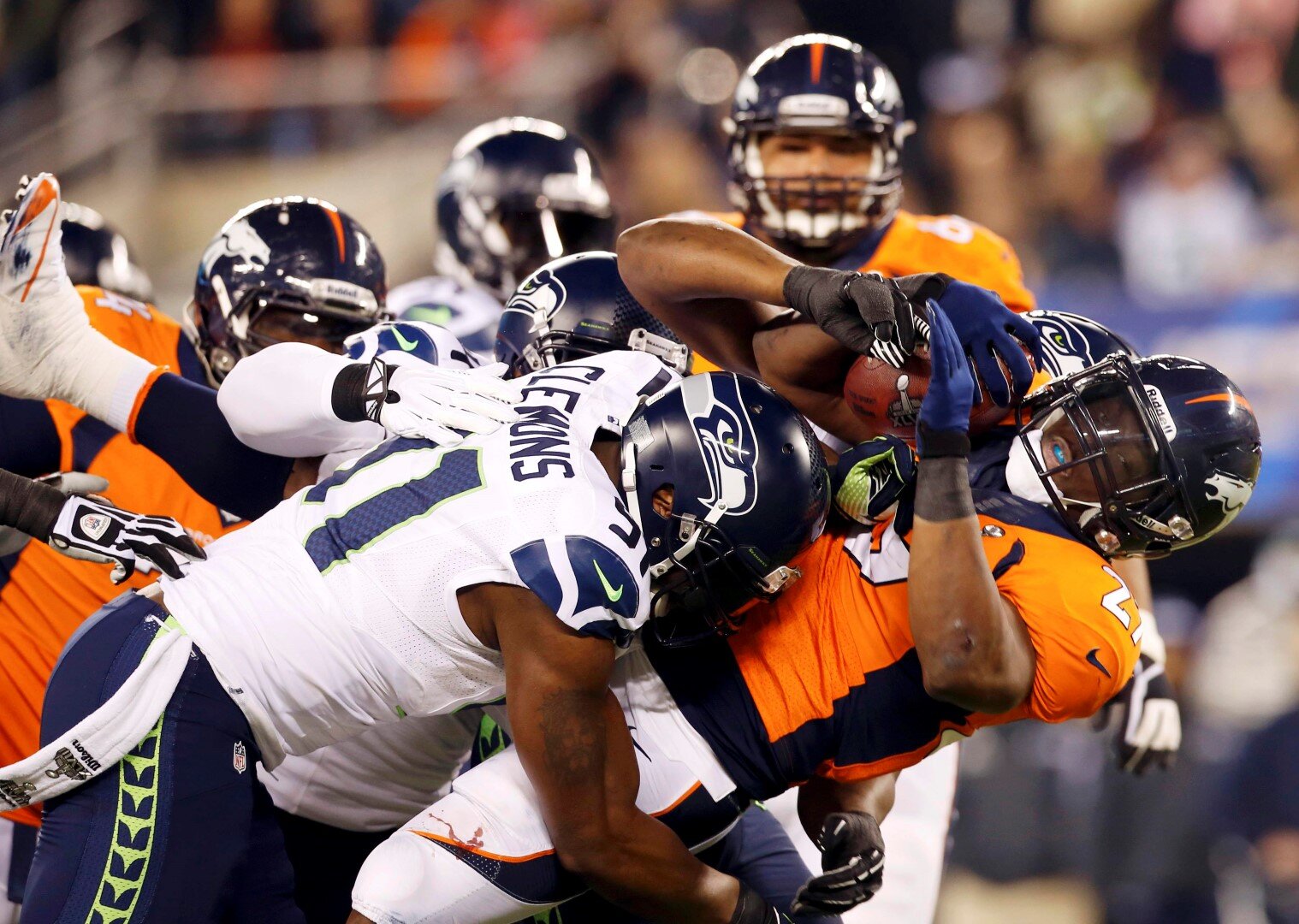 Under sports. Супербоул. Супербоул игроки. Super Bowl 2014. Super Bowl финал картинка.